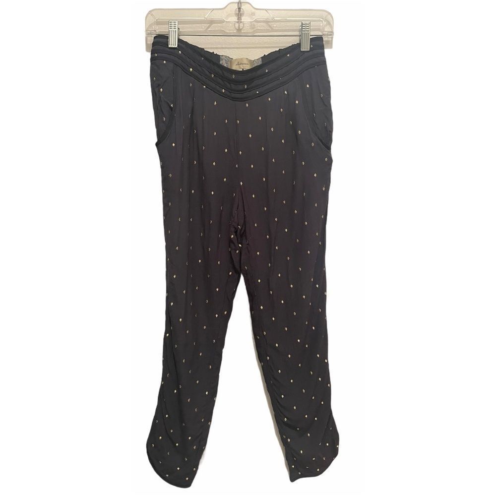 Anthropologie blue pants with gold diamonds